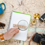 Biggest travel news stories in 2026 busy airport terminal and travelers