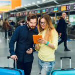 Travel industry updates 2026 busy international airport terminal