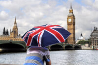 UK immigration post-Brexit debate flares up as St. George flags fly across British neighborhoods amid rising support for the populist right.